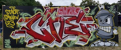 Red and Grey and Colorful Stylewriting by CHE. This Graffiti is located in Aachen, Germany and was created in 2023. This Graffiti can be described as Stylewriting and Characters.