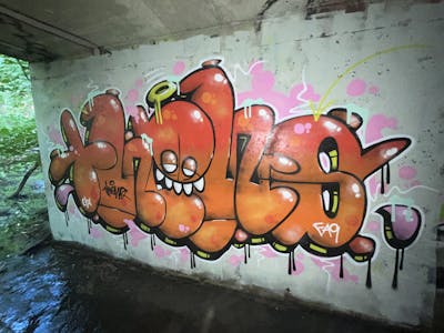 Orange Stylewriting by THEWS, CFA and Faq. This Graffiti is located in Hamilton, Canada and was created in 2023. This Graffiti can be described as Stylewriting, Characters and Abandoned.