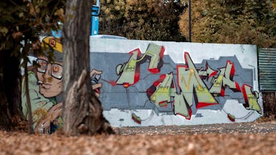 Grey and Light Green and Colorful Stylewriting by Fier and Cime. This Graffiti is located in Budapest, Hungary and was created in 2022. This Graffiti can be described as Stylewriting, Characters and Wall of Fame.