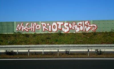 Chrome Street Bombing by Riots, NBSWE and nacho. This Graffiti is located in Leipzig, Germany and was created in 2010.