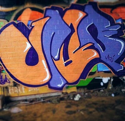 Orange and Blue Stylewriting by Jibo. This Graffiti is located in Paris, France and was created in 2013.