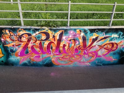 Orange and Red and Violet Stylewriting by Lady.K and 156. This Graffiti was created in 2018 but its location is unknown. This Graffiti can be described as Stylewriting and Wall of Fame.