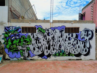 Chrome and Violet Stylewriting by Giusseppe. This Graffiti is located in PUERTO VALLARTA, Mexico and was created in 2021. This Graffiti can be described as Stylewriting and Characters.