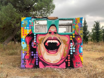 Colorful Characters by bzks. This Graffiti is located in Thessaloniki, Greece and was created in 2023. This Graffiti can be described as Characters, Streetart and Abandoned.