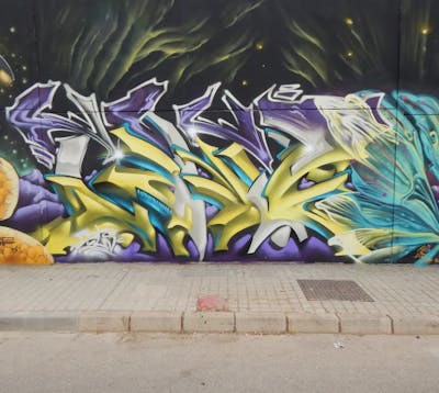 Violet and Yellow Stylewriting by Tinto 247. This Graffiti is located in Sevilla, Spain and was created in 2022. This Graffiti can be described as Stylewriting and 3D.