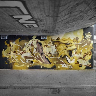 Beige and Yellow Stylewriting by Crazy Mister Sketch. This Graffiti is located in Innsbruck, Austria and was created in 2021. This Graffiti can be described as Stylewriting, Characters and Wall of Fame.