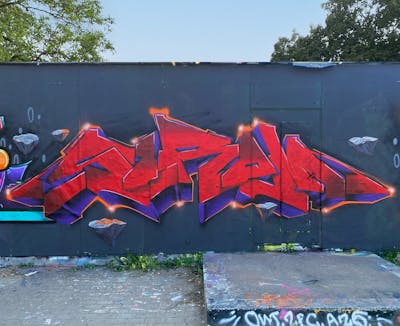 Red and Violet and Grey Stylewriting by Sirom. This Graffiti is located in Leipzig, Germany and was created in 2022. This Graffiti can be described as Stylewriting and Wall of Fame.