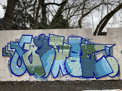Green and Blue and Light Blue Wall of Fame by Gauner. This Graffiti is located in Germany and was created in 2022. This Graffiti can be described as Wall of Fame and Stylewriting.