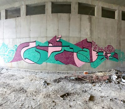 Coralle and Cyan Characters by urine, OST and Hülpman. This Graffiti is located in Ljubljana, Slovenia and was created in 2019. This Graffiti can be described as Characters, Stylewriting and Futuristic.