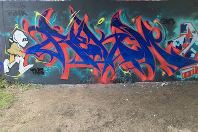 Red and Blue Stylewriting by Micro79 and Rokim. This Graffiti is located in Newcastle, United Kingdom and was created in 2023. This Graffiti can be described as Stylewriting, Characters and Wall of Fame.