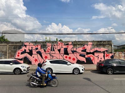 Coralle and Black Stylewriting by Crude. This Graffiti is located in Bangkok, Thailand and was created in 2022. This Graffiti can be described as Stylewriting and Street Bombing.
