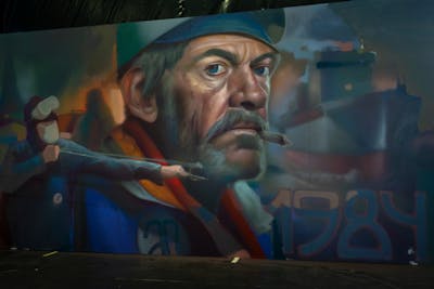 Colorful and Grey Characters by Nexgraff. This Graffiti is located in Bilbo, Spain and was created in 2022. This Graffiti can be described as Characters, Murals, Streetart and Atmosphere.