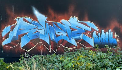 Light Blue and Red Stylewriting by Sirom and Rowdy. This Graffiti is located in Radebeul, Germany and was created in 2022.