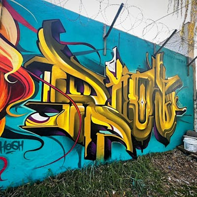 Yellow and Cyan Stylewriting by Riot and Top2. This Graffiti is located in Johannesburg, South Africa and was created in 2023.