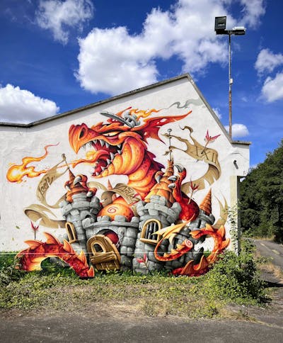 Orange and Grey Characters by Abys. This Graffiti is located in SCAFLAND, France and was created in 2022. This Graffiti can be described as Characters, Murals and Streetart.