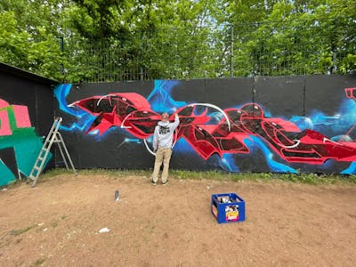 Light Blue and Red Stylewriting by Fakie. This Graffiti is located in Dresden, Germany and was created in 2022.
