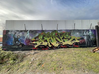 Green and Colorful Characters by Spast, Picks and Finals Crew. This Graffiti is located in Hettstedt, Germany and was created in 2021. This Graffiti can be described as Characters and Stylewriting.
