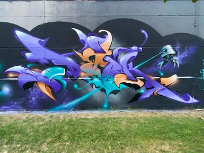 Cyan and Violet and Orange Characters by Graff.Funk and Dark. This Graffiti is located in Leipzig, Germany and was created in 2023. This Graffiti can be described as Characters, Murals and Stylewriting.