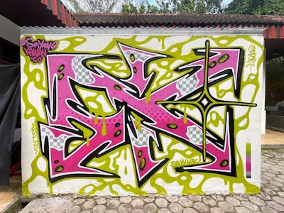 Coralle and Light Green Stylewriting by M3C and Sakey. This Graffiti is located in Jambi City, Indonesia and was created in 2022.