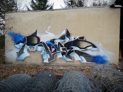 Light Blue and Black Stylewriting by Roweo and mtl crew. This Graffiti is located in Saalfeld (Saale), Germany and was created in 2021.