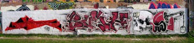 Red and Grey Stylewriting by urine, Jolly Fellow, OST and Bush. This Graffiti is located in Leipzig, Germany and was created in 2012. This Graffiti can be described as Stylewriting, Wall of Fame and Characters.