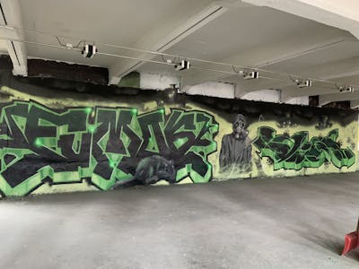 Black and Green Stylewriting by Fumok and Fakie. This Graffiti is located in Döbeln, Germany and was created in 2021. This Graffiti can be described as Stylewriting, Abandoned and Characters.
