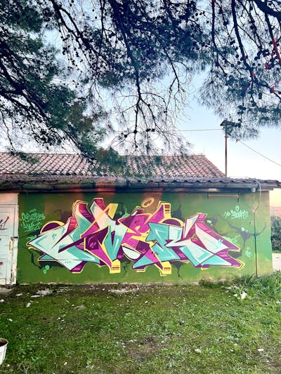 Cyan and Colorful and Coralle Stylewriting by Liver and OSP Crew. This Graffiti is located in Sibenik, Croatia and was created in 2024. This Graffiti can be described as Stylewriting and Abandoned.