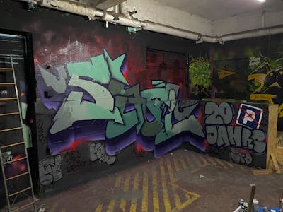 Cyan and Violet and Grey Stylewriting by Safi. This Graffiti is located in Germany and was created in 2023.