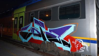 Colorful and Light Blue and Red Stylewriting by Zota. This Graffiti is located in Greece and was created in 2022. This Graffiti can be described as Stylewriting and Trains.