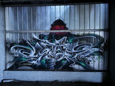 Grey and White Stylewriting by CETYS.AGF. This Graffiti is located in Nitra, Slovakia and was created in 2023.