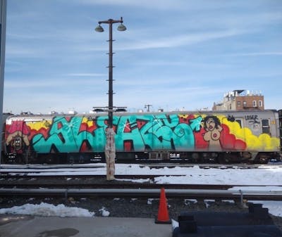Cyan and Colorful Wholecars by SLEAZE. This Graffiti is located in NEW YORK CITY, United States and was created in 2022. This Graffiti can be described as Wholecars.