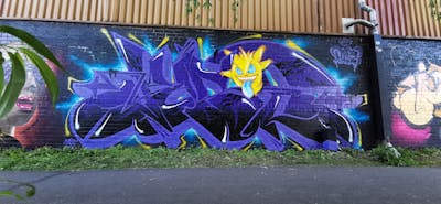 Violet and Yellow Stylewriting by Pase. This Graffiti is located in United Kingdom and was created in 2023. This Graffiti can be described as Stylewriting, Characters and Wall of Fame.