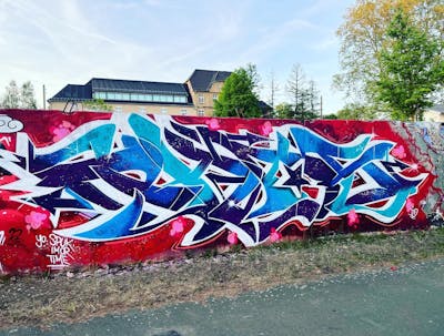 Red and Blue Stylewriting by Phas196. This Graffiti is located in Quedlinburg, Germany and was created in 2022. This Graffiti can be described as Stylewriting and Wall of Fame.