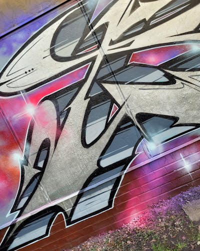 Chrome and Grey and Colorful Stylewriting by Riots. This Graffiti is located in Leipzig, Germany and was created in 2024.