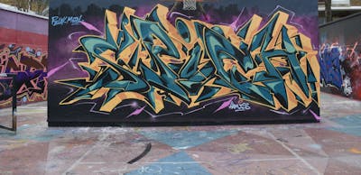 Cyan and Orange and Coralle Stylewriting by Chips and CDSK. This Graffiti is located in London, United Kingdom and was created in 2023. This Graffiti can be described as Stylewriting and Wall of Fame.