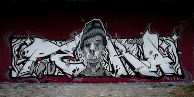 Grey and White Stylewriting by Notes and POK. This Graffiti is located in Prague, Czech Republic and was created in 2022. This Graffiti can be described as Stylewriting and Characters.