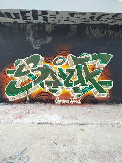 Green and Orange and White Stylewriting by Baron. This Graffiti is located in Greece and was created in 2022.