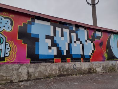 Light Blue and Black Stylewriting by Gameboy Evil. This Graffiti is located in Kosice, Slovakia and was created in 2023.