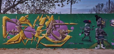 Gold and Green and Violet Stylewriting by fil, urbansoldierz, graffdinamics and mtrclan. This Graffiti is located in Vicar, Spain and was created in 2023. This Graffiti can be described as Stylewriting and Characters.