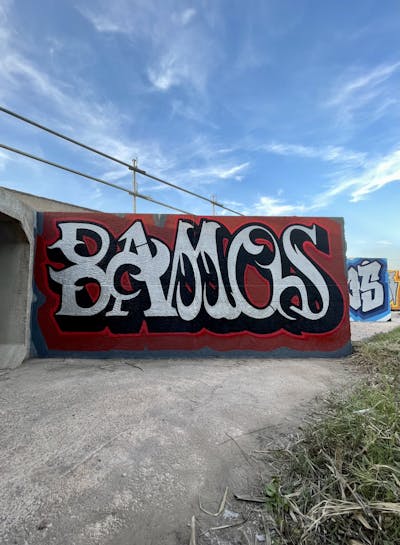 Red and Black and Chrome Stylewriting by Bamos. This Graffiti is located in Valencia, Spain and was created in 2023.