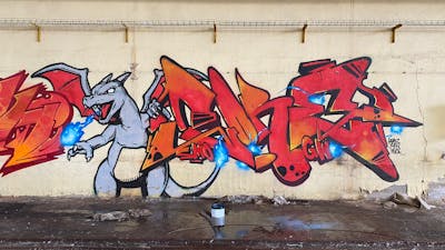 Red and Orange and Grey Stylewriting by Core246 and smo__crew. This Graffiti is located in London, United Kingdom and was created in 2022. This Graffiti can be described as Stylewriting, Characters and Abandoned.