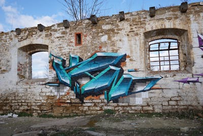 Light Blue Stylewriting by TMF and Kan. This Graffiti is located in Weimar, Germany and was created in 2021. This Graffiti can be described as Stylewriting and Abandoned.