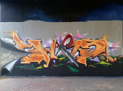 Orange and Red and Colorful Stylewriting by Chr15 and Aser. This Graffiti is located in Leipzig, Germany and was created in 2023. This Graffiti can be described as Stylewriting, Characters and Wall of Fame.