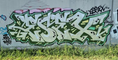 Chrome and Green Stylewriting by ESSEX. This Graffiti is located in Australia and was created in 2023.