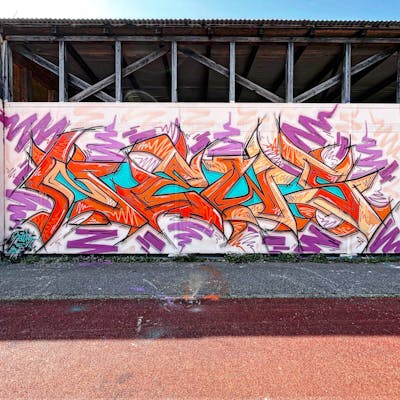 Orange and Cyan and Violet Stylewriting by News. This Graffiti is located in Regensburg, Germany and was created in 2023.
