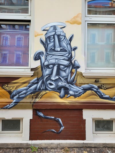 Beige and Grey Characters by Riots and Kasimir. This Graffiti is located in Leipzig, Germany and was created in 2024. This Graffiti can be described as Characters and Commission.