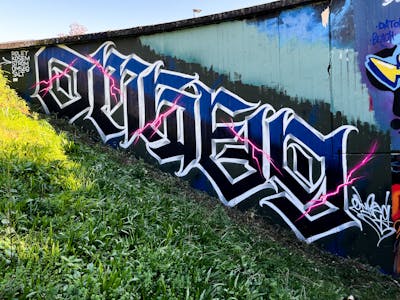 Black and Colorful Stylewriting by omseg. This Graffiti is located in Freiburg, Germany and was created in 2022.