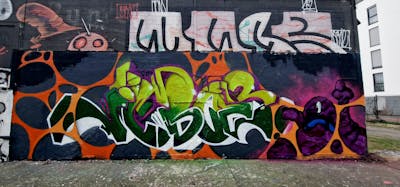 Colorful Stylewriting by Jibo and MDS. This Graffiti is located in Düsseldorf, Germany and was created in 2023. This Graffiti can be described as Stylewriting, Characters and Wall of Fame.