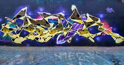 Beige and Brown and Colorful Stylewriting by SIDOK. This Graffiti is located in London, United Kingdom and was created in 2022. This Graffiti can be described as Stylewriting, Wall of Fame and Futuristic.