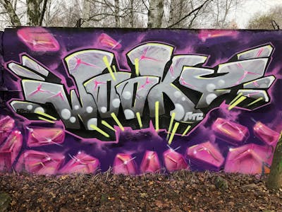 Violet and Grey Stylewriting by WOOKY. This Graffiti is located in Berlin, Germany and was created in 2022. This Graffiti can be described as Stylewriting and Wall of Fame.